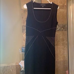 Tight black studded dress